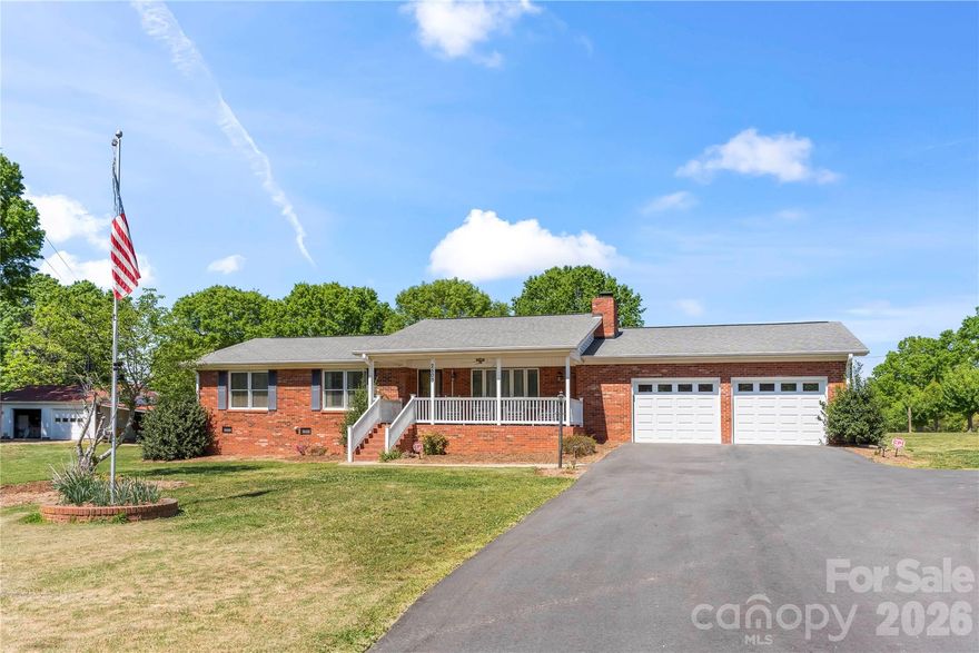 If you are looking for a well maintained  brick ranch, you can stop looking. This charming beauty has three bedrooms, two and a half baths and plenty of kitchen cabinets. Enjoy your morning coffee in the light and bright sunroom while watching all of the birds. This property offers a country setting while close to amenities. This listing has two parcels numbers, with a combined acreage listed on taxes as 2.25. The house sits on 1.36 acres and the second parcel is listed as .86 acres. The second parcel has a separate septic and its own electric available. It used to house a 3 bedroom mobile home so there are  many possibilities.  There is a wonderful opportunity for someone that has a car repair business to use  the extra two car garage and /or workspace. There are two lean tos that currently house extra equipment, chickens and bunnies. This gem offers so many extras including a salt water softener, newly paved driveway, epoxy garage and front porch, alarm system, newer hot water heater, gas range, newer carpet in bedrooms and updated guest bathroom. Come and take a look at the beautiful curb appeal and call it home.