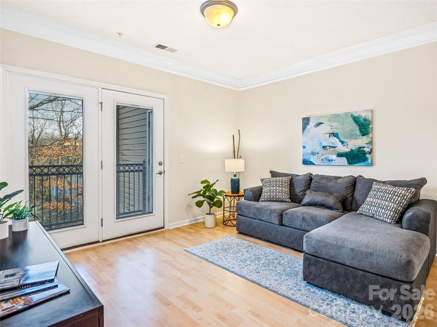 Step into comfort and convenience at this charming condo, located in the heart of south Asheville. Move-in ready and pet friendly! The community is peaceful, with no rentals allowed, so you’ll enjoy a pleasant atmosphere and friendly neighbors. Inside, you’ll find a spacious, modern layout. There are two bedrooms and two baths, offering plenty of space for family, guests, or even a home office. The primary bedroom features an ensuite bathroom while the second bedroom is perfect for versatility. The living area is bright and welcoming, with an inviting color palette. The kitchen is equipped with stainless appliances. Easy-care flooring in the main areas and cozy carpet in the bedrooms. The east-facing covered balcony is a perfect spot for morning coffee, tending to your favorite plants, or simply unwinding while you take in leafy summer views or mountain vistas in the winter. All appliances, including the washer and dryer, are included. A new HVAC system installed in 2023 (valued at $7,000) ensures comfort year-round. The neighborhood is beautifully landscaped and offers a community picnic area, walking trails for you and your pets, and plenty of onsite parking. This condo is tucked away in a quiet part of the community, giving you the best of both tranquility and accessibility. Located just minutes from downtown Asheville, Biltmore Village, restaurants, and shopping. The peaceful setting and easy access to local attractions make this condo a wonderful place to call home.