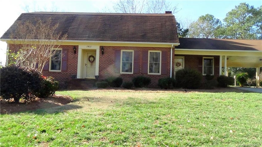 Very nice well maintained home in a  quiet neighborhood  conveniently located. Seller custom built home in '69. Large den w/fireplace and gas logs, formal dining and living room both w/dentil moulding. Nice size bedroom on main floor and two upstairs.  Basement partially finished with large Rec room with fireplace.  Walk in floored  attic space upstairs for lots of storage.  Nicely landscaped yard with a large back yard.