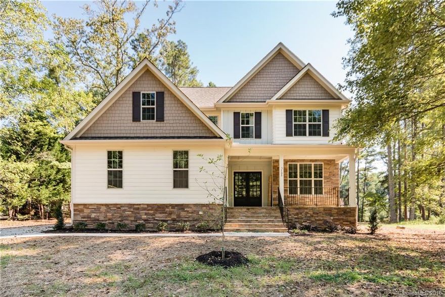 1 of 3 lots! Craftsman-style home ready for fall. High-quality, high-style w/bright, spacious, open plan. All the upgrades & trendy finishes: gorgeous lighting, great trim, dark hardwoods galore. WOW kitchen w/island, granite, tile bcksplsh, SS appl’s. 1st fl office/BDRM. Pretty master w/upscale bath & huge closet. Private 3rd floor bonus & storage. Big covered porch overlooks conservation area. Great access to SouthPark, Uptown, private schools. Terrific value for this close-in location!
