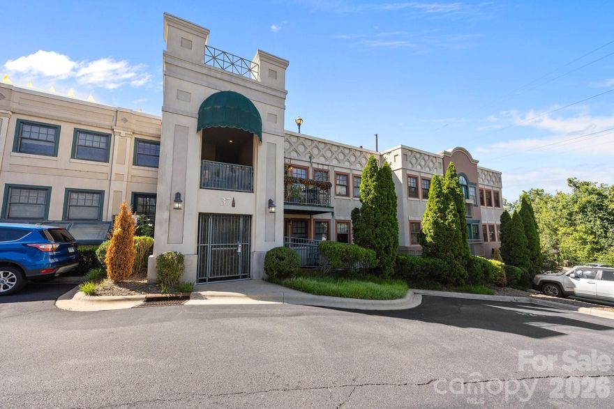 Book your showing today for this rare Downtown condo in a location that puts everything at your fingertips. Best of all, this condo has a short term rental permit already in place!! This stylish ground-floor unit comes fully furnished and features modern finishes, bamboo floors, breakfast bar, creative storage, and a spacious bathroom with tub & walk-in shower. The building offers a community rooftop terrace with city views, a fitness center, and on-site laundry. Live across from Harrah’s Cherokee Center and just steps from Asheville’s best dining, breweries, art galleries, shops, and entertainment. Whether you're looking for an investment property, personal city retreat, or a place to call home, this vibrant location makes it easy to live, work, and play in the heart of it all. The building has a brand new roof from summer 2025. Priced below tax value!!