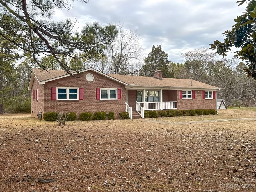This beautiful three bedroom, two bathroom brick ranch sits on 1.87 acres and located 15 minutes to Rock Hill! This home offers so much opportunity for you to make it yours! Beautiful hardwood floors, large kitchen, huge covered car port and a big covered front and back porch! This home is ready for you to call home! Home is being sold AS-IS. Schedule your showings today!