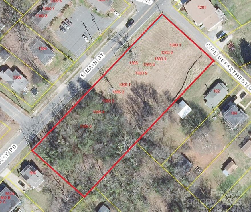 Shovel ready lot with approved plans for 10,000sqft single story commercial structure with 9 +/- spaces ranging from 570sqft to 1440sqft with multiple units able to be combined. Zoning permit is approved and paid for. Building permit is approved and paid for. Engineered plans approved and paid for. This lot is ready for you to start work tomorrow! Estimated rents are $22-29/sqft. Sewer and water taps and capacity fees are paid for. Location to be set by new owner but plans call out their ideal location. Estimated value after construction is $4.5m.