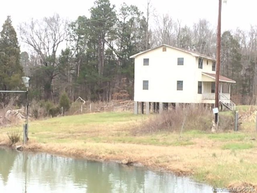 Great potential.  Interior of house has framing only - no finished rooms - but it comes with 6+ acres, a pond, mobile home, and outbuildings.   New furnace in mobile home.  Property consists of Tax Map 360, parcels 125 and 167.  Located at the end of the street.  Owner is willing to negotiate and says "present reasonable offer."