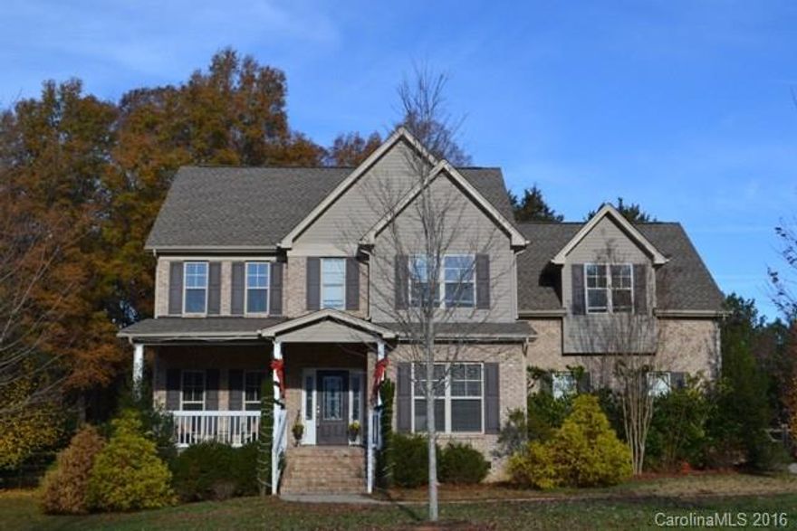 Beautiful home sits on an acre and has a partially fenced backyard.  Property does go to the road in the back.  The home offers a guest bedroom on main level, formal dining room, great room with fireplace/gas logs.  Gorgeous granite kitchen with stainless appliances, work island and breakfast bar!  Master and two additional bedrooms upstairs along with a large bonus room.  Laundry is conveniently located upstairs with the bedrooms!