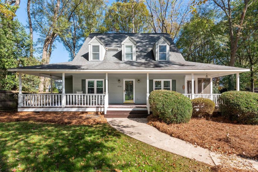Charming Cape Cod style home in the desirable Woodbridge neighborhood near the coveted Charlotte Country Day School & SouthPark Mall. Great local amenities including choice restaurants & excellent grocery stores. Location is a 20 minute drive to Uptown Charlotte. Enjoy a southern living experience w/a covered wrap-around porch on a quiet & peaceful cul-de-sac. This home boasts a potential mother-in-law BR w/convenient full BA downstairs. The primary bedroom is upstairs w/bathroom attached; additional two bedrooms and a full bathroom. Spacious and bright kitchen with skylights; large island; built-in seating area for dining; wall oven unit; and lots of cabinets for storage. Great flow and perfect for entertaining. Cozy family room/den with fireplace; large living room which can also serve as a home office; and additional side room which can be a play room; additional half-bath. Wooden walk-in shed in the back yard for additional storage. Don't let this lovely property get away!!!