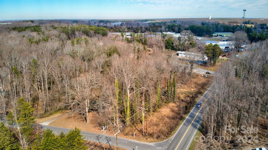 Discover the potential of this exceptional 2.17 ± acre lot, strategically located at 109 Lost Tree Lane in the heart of Mooresville, NC. This prime piece of land enjoys a convenient position on Highway 150. Zoned HLI, this land is a blank canvas brimming with possibilities. Its strategic location ensures you will benefit from a stream of potential customers, it's surrounded by appx. 33,000 residents in a 3-mile radius. This area is characterized by a diverse mix of automotive, industrial, and highway businesses, creating an environment ripe for growth and prosperity. This property provides an excellent foundation for realizing your business aspirations. Don't let this fantastic opportunity slip through your fingers. Seize the chance to acquire affordable and highly desirable commercial land in the flourishing submarket of Iredell County. Take the leap and make your mark in this dynamic and continuously developing region. Your business's future starts here! Also listed at MLS 4167202.
