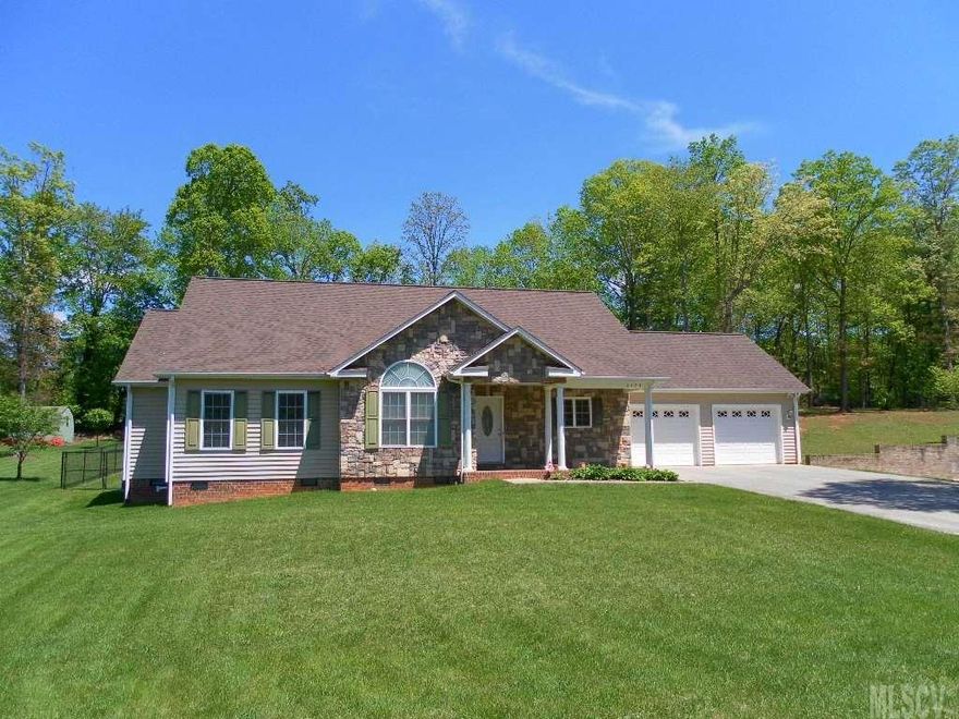 This immaculate and beautiful home looks nearly new! The foyer opens to a great room with a cathedral ceiling, gas log fireplace with granite tiles, and gorgeous hardwood flooring. French doors off the great room take you to a large deck and lovely fenced back yard. The kitchen has an abundance of maple cabinetry and counter space as well as a nice eating bar. The master bedroom is huge and the master bath boasts of a jetted tub, separate shower, double lavatories, gleaming tile floors and a walk-in closet. The double garage is oversized for cars and space for lawn equipment, and has pull down attic stairs for additional storage. This home has been extremely well maintained. It will be a pleasure to show!