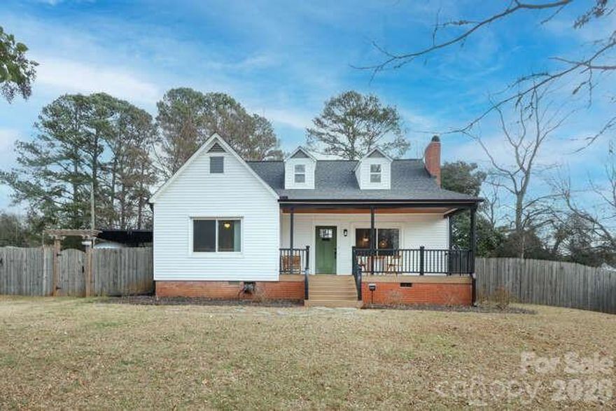 This charming cottage located on a quiet cul-de-sac street, on almost a half an acre, is move in ready. Featuring 4 bedrooms, a flex room that could be used as an additional bedroom or dedicated office, 2 full baths, and a large open concept living, dining, and kitchen area this home offers lots of flexible living space. A large back yard offers plenty of room to create your own vision for an outdoor oasis, with the potential for an addition, garage, or ADU. The basement features lots of extra room for storage and is accessible from both the interior and exterior of the home for ease and convenience. 

Current owners have updated the kitchen and bathrooms finishes, refinished the floors, and painted throughout. A new roof was installed in 2021, the front porch, gutters, and downspouts were replaced in 2025, new front door installed in 2025, back door was replaced in 2021, and a new furnace, heat pump and forced air system in 2022, and a new water in 2024. Just off Freedom Drive offers close proximity to South End, Uptown, and the airport this home is truly a gem.

Please note airstream in backyard does not convey but is available for sale separately if interested.