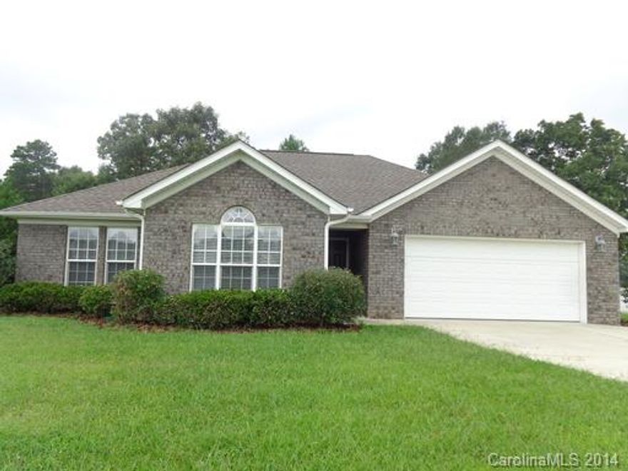 This lovely home has vaulted and trey/coffered ceilings, hard wood and tile floors, a breakfast area and a fireplace in the Great Room. The warm and inviting kitchen comes with all stainless steel appliances plus a pantry. The Master Suite has a walk in closet and the Master Bath has dual sinks, an oversized tub and a separate shower. There is a covered patio that leads you to a well manicured back yard.