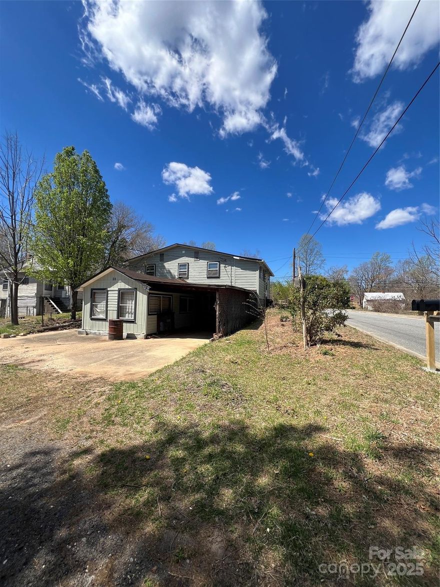 Seller financing available and R-2 zoning! Affordable home close to everything Marion, NC has to offer. Property has had many recent updates including new metal roof on main part of the home, new sheetrock, upgraded kitchen & baths! The basement has potential for an apartment, art studio, workshop or great storage.