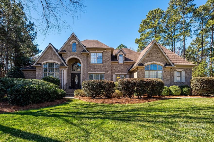 Beautiful custom home in Fort Mill's desirable Beckenham neighborhood on an acre of land with pool. Enter two story foyer with oak floors and open kitchen. Main floor offers master suite with fireplace, two 1/2 baths, great room, living room, dining room, utility room and office. Second floor has media room with built in cabinets, three large bedrooms, full bath and jack-n-jill bath. Surround system throughout home. Three car garage. Private back yard with beautiful large gunite pool and aluminum fencing. Close proximity to Ballantyne, schools, shopping and dining. Pool area surrounded by full size palm tree for a more relaxing, tropical-like oasis with standout full brick paver patio surrounding the pool.