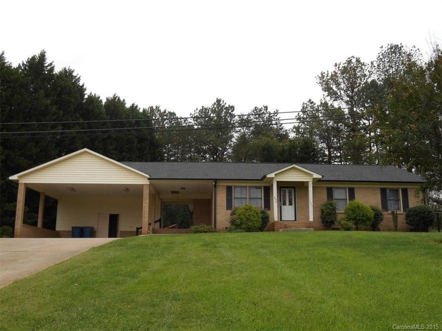 Priced well below appraised value!  This home features an oversized 300+ square foot sunroom on back of the home & a great breezeway area located between the home and carport.  Great storage off the carport and breezeway.  There are hardwoods in the den, dining area and bedrooms.  This home is exceptionally clean and ready for the new owner to move right in!  The vacant lot to the right of the home is included in this price.  Home is within walking distance to parks and downtown Maiden shops.