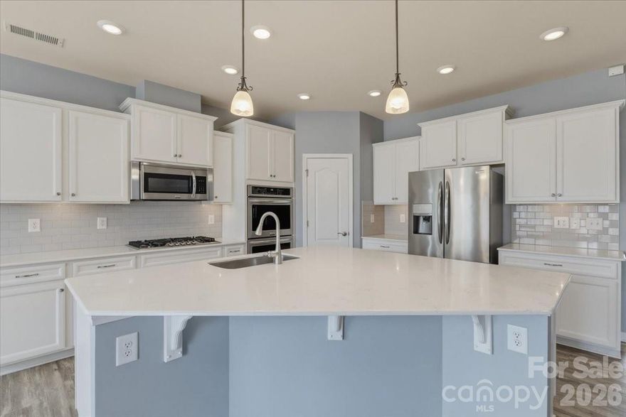 Welcome home to this beautifully maintained 2018-built home in the sought-after Summerhouse at Paddlers Cove, just minutes from Lake Wylie and located in an area with highly-rated schools. With 3 bedrooms, 3 full baths, and a flexible 1.5-story layout, this home offers comfort, style, and versatility.

The main level features a spacious kitchen with a large island, granite countertops, and a double oven, perfect for entertaining or everyday living. The living area is anchored by a cozy fireplace and flows easily to the screened porch and paver patio, creating a great space to relax or host guests. The fenced backyard offers a functional outdoor space for pets, play, or gatherings.

Upstairs, an oversized loft, bedroom, and a full bath provide the ideal setup for a guest suite, home office, media room, or private retreat.

Additional highlights include fiber cement siding, a tankless water heater, freshly deep-cleaned carpets, and newer garage door opener installed in 2024.

Residents enjoy access to community amenities including pools, playground, and walking trails, along with paddlesports access to Lake Wylie on the Paddlers Cove side, offering a unique outdoor lifestyle right in your neighborhood.

With summer just around the corner, this is a great opportunity to move in before the next school year begins and start enjoying everything this home and community have to offer.

Schedule your showing today!