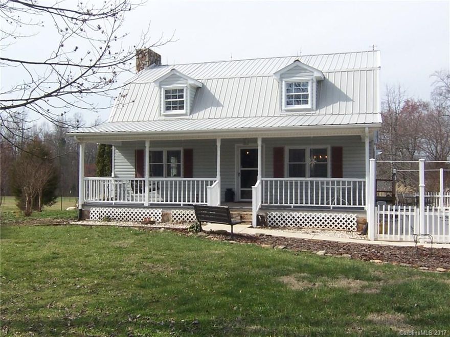 1 1/2 story country home on almost 2 acres. New kitchen with granite countertops and stainless appliances. Updated bathrooms. Huge master suite. Rocking chair front porch; rear deck with arbor. Full basement with 2-car & 1-car garages. In-ground pool. RV shed, storage building. Fenced pasture. MUST SEE!