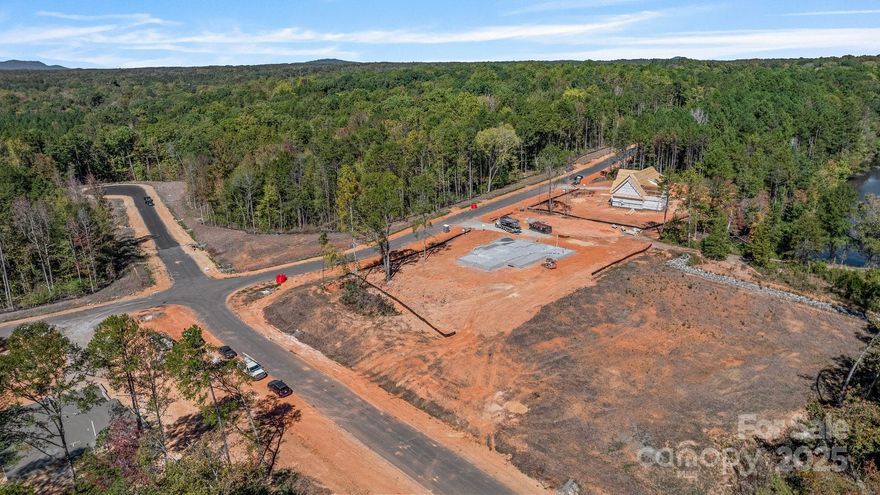 Discover Southern Pine Lake, Clover’s newest upscale community where luxury meets convenience. Tucked away in a tranquil setting, this exclusive enclave offers 36 spacious homesites, each spanning over one acre, providing privacy and serenity while remaining just minutes from big box stores, restaurants, shopping, and major thoroughfares. Enjoy an easy drive to Uptown Charlotte and CLT Airport, making daily commutes and travel effortless. Clover’s highly rated schools, strong sense of community, and commitment to quality living make it one of South Carolina’s most desirable places to call home. Southern Pine Lake blends thoughtful planning with timeless appeal, creating the perfect environment for families to grow and thrive. Come build your dream home and experience the unmatched lifestyle this special community offers.