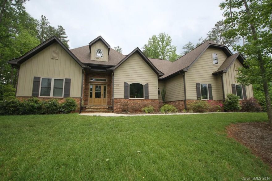 Custom Home,4BR,3BA,formal dining room, hardwoods, ceramic tile, granite counters in kitchen and baths, SS appliances, arched entries, recessed lighting throughout, coffered ceiling in Dining Room, Bonus room or 4th bedroom up with a full bath,  large deck overlooking a beautiful private back yard.