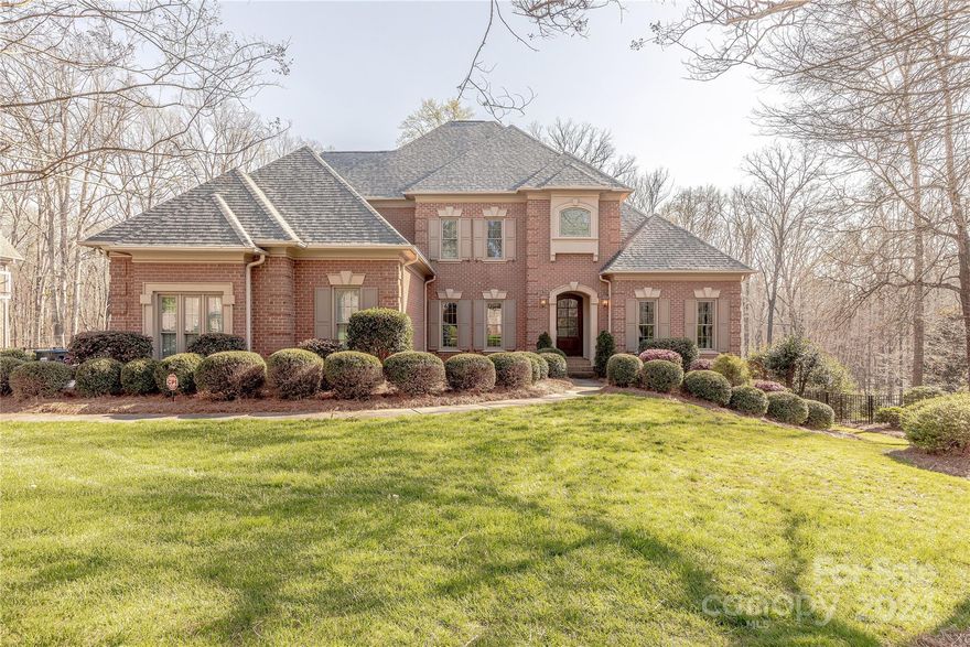 Luxury living in Weddington awaits in this meticulously updated all-brick custom home with a finished basement. Hardwood floors grace the open-concept layout. A Chef’s Kitchen boasts premier Sub-Zero & Thermador appliances. The primary-on-main features dual walk-in custom closets & a spa-like bathroom with heated floors, a modern freestanding tub & glass-enclosed shower with dual rain heads & body jets. Upstairs features an oversized bonus room & 3 generously sized suites, each with en-suite baths. The basement offers a great room with a kitchenette, study, flexible bedroom/billiard room & home theater complete with stadium seating. Step outside to a private backyard oasis featuring a saltwater pool with spa, built-in grill, masonry fireplace & trampoline area against a serene wooded backdrop. Enjoy peace of mind with the roof, HVAC, windows & water heater replaced within 5 years. Conveniently located & with acclaimed Marvin school assignments, this property is a must-see!