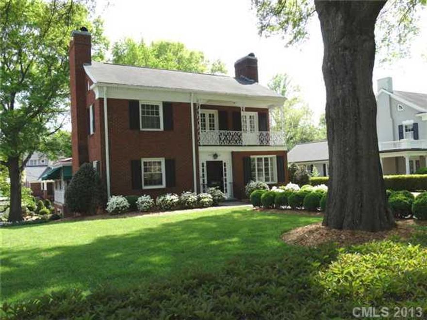 Stunning executive Georgian Colonial w/elaborate detail in sought after historic downtown neighborhood situated on .45 corner lot w/manicured lot featuring rear yard bordered w/brick fencing/hedge, ideal for formal & informal summer fun complimented by mature oak, hickory trees -- elegance & comfort throughout, including marble, moldings, hdwd, large GR w/FP w/gracious space to enjoy family &...