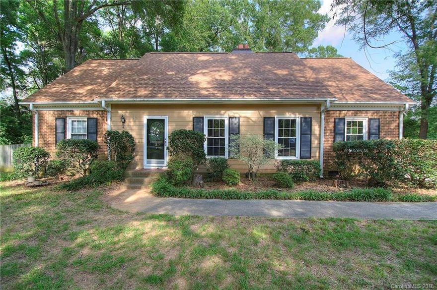 Awesome opportunity to invest in a 1.5 Story Cape Code situated on over a 1/2 acre private fenced in lot.  Recent architechual roof installed, wood laminate flooring, Huge Mst Bedroom on the main with patio access to hot tub, a 16 x 16 Sunroom.  Real wood cabinetry is installed in the kitchen.  Huge upstairs bonus room with walk in closets.  Tiled flooring in the bathrooms.  Minutes away from I485 and future Monroe By-pass.