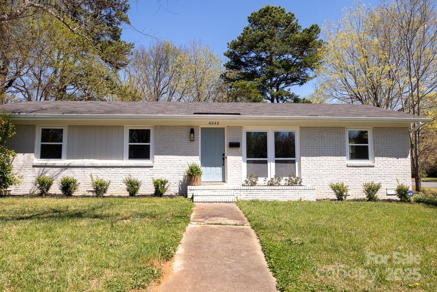 Classically renovated brick home on a desirable corner lot in the Windsor Park neighborhood! Home has been lovingly restored with real hardwood floors throughout. Fully remodeled kitchen features new SS appliances, granite countertops and new cabinetry. Primary bedroom has entirely updated en-suite bath. Hall bath features custom vanity, granite counters, ample storage and marble flooring. Bright secondary bedrooms. Large 4th bedroom/office/second living room with new carpet and extra large closet off the kitchen. Updates include brand new windows, plumbing, insulated ductwork, gutters, water heater, and landscaping. Fresh paint throughout. Roof in great condition. Storage shed in backyard. Minutes away from Plaza Midwood, NoDa and a short commute to Uptown! Walk to the neighborhood urban farmstand!