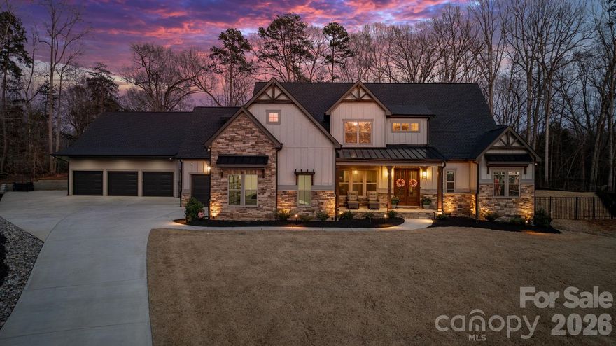 Luxury Living on 1.30 Acres in Prestigious James Plantation.
Welcome to an extraordinary estate in one of Denver's most sought-after communities, James Plantation. This stunning 1.5-story, 5-bedroom, 3.1-bathroom home offers the perfect blend of luxury, functionality, and resort-style living on a sprawling 1.30-acre lot. Designed for convenient living, oversized primary bedroom, spa-inspired primary bathroom featuring heated floors, and an oversized his and hers walk-on closet as well as laundry are all located on the main level with a walkout leading directly to your private backyard oasis. The custom-designed outdoor space was built to feel like your own private spa retreat, featuring a 16x32 in-ground heated and chilled pool with a stunning three-tier waterfall feature, perfect for year-round enjoyment. The heater/chiller combo was installed just 6 months ago and still has 2.5 years of warranty remaining, with all pool equipment covered under a 3-year warranty with approximately one year still remaining. The oversized 37x50 three-car garage is a showpiece in itself, featuring three 10x10 doors, 12-foot ceilings, Lift Master side-mounted quiet openers, two mini splits for heating and cooling, and a half bath with sink. Combined with the attached three-car garage, this property can accommodate up to 9 vehicles making it an equestrian or collector's dream. Inside, you'll find engineered hardwood floors flowing throughout and luxury finishes at every turn. This smart home is equipped with a WiFi-enabled irrigation system (front and back) controlled via the HydraWise app, fully customizable multi-color landscape and home uplighting managed through the Luxor app, and a CPI security system that conveys with the home including three cameras and a video doorbell. Located in Denver, NC with quick and easy access to Highway 16 one of the most convenient routes in the area, James Plantation offers privacy, prestige, and accessibility. This is more than a home.. it's a lifestyle. Schedule your private tour today and experience luxury living at its finest.