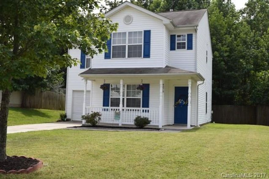 This is an awesome home in a wonderful neighborhood. Family room has gorgeous stained concrete flooring.Nice sized back yard with patio and privacy fence, attached garage. Spacious great room with fireplace, large kitchen w/breakfast bar area. All bedrooms located upstairs as well as the laundry area. Clover school district. Won't last long!