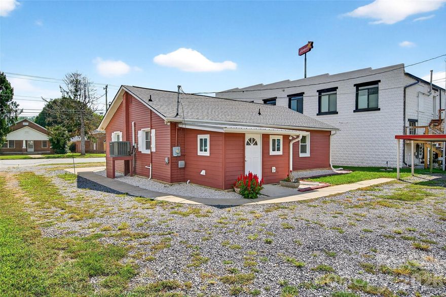 **Price Improvement on this versatile home in Old Fort!** Walkable to everything, this property offers a great work-from-home opportunity with a large lot—or simply enjoy the spacious yard. The possibilities are endless.

Just in time for spring buyers looking for a place to live and work, this is your chance to own a piece of this vibrant mountain town known for its outdoor adventures. This newly updated, **move-in ready** 3-bedroom, 1-bath brick ranch sits on a spacious city lot along Catawba Avenue.

The home is connected to city water and sewer. While it sustained damage from Helene, it has since been completely and beautifully renovated.

Fun fact: this property once served as Old Fort’s local chiropractor’s office for many years, making it a unique part of the town’s history.

Whether you’re looking for a comfortable residence or a live-and-work opportunity, this location delivers. The property features excellent Catawba Avenue frontage with ample parking—and potential space to build an additional structure.

A rare opportunity to own a home that can be used for residential or potential commercial purposes. Truly a blank canvas for your next chapter.

**Schedule your showing today!**
