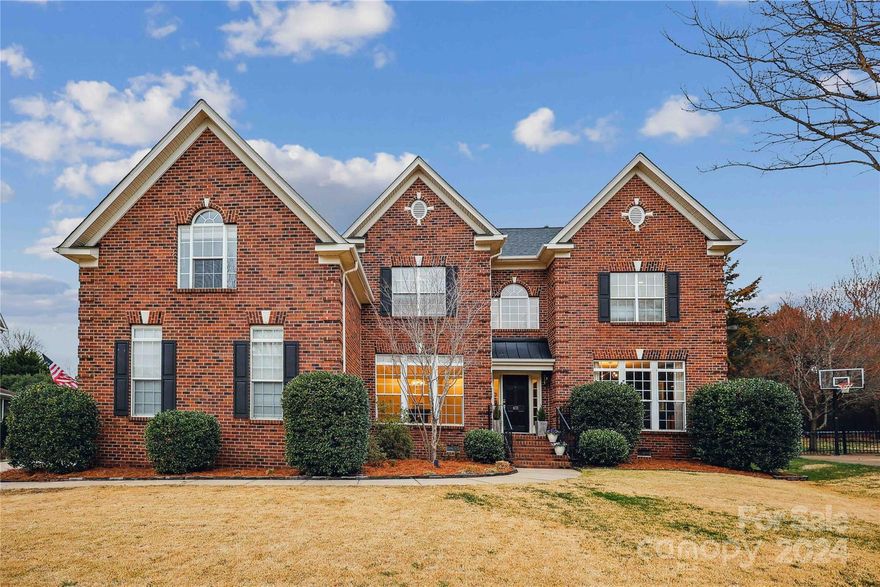 HUNTER OAKS stately full brick home on a .37 acre cul-de-sac, minutes from shopping & dining at Blakeney, Rea Farms & Waverly. Marvin Ridge high school. Two-story foyer. Remodel 2022-24 includes: NEW 6” white oak solid wood floors throughout, neutral paint, new carpet in bedrooms & bonus. Private study w/French doors, large dining room w/plenty of room for family gatherings, NEW kitchen w/cabinets to the ceiling, large island, Bosch appliances, 36" gas cook top w/pot filler, custom hood, designer lighting, quartz counters. 1st floor guest room w/updated full bath. Enjoy cozy nights in the family room by the updated quartz gas fireplace. Master up- His & Her walk-in closets, double trey ceiling & huge bathroom. 3 generous size bedrooms & 2 additional updated full baths. PLUS a bonus for family movie/game night. 3 car side-load garage. Walk-up 3rd floor has studs & is ready to finish for 2nd bonus. Private back yard, fenced, lots of room for outdoor fun. See Features/Upgrades sheet.