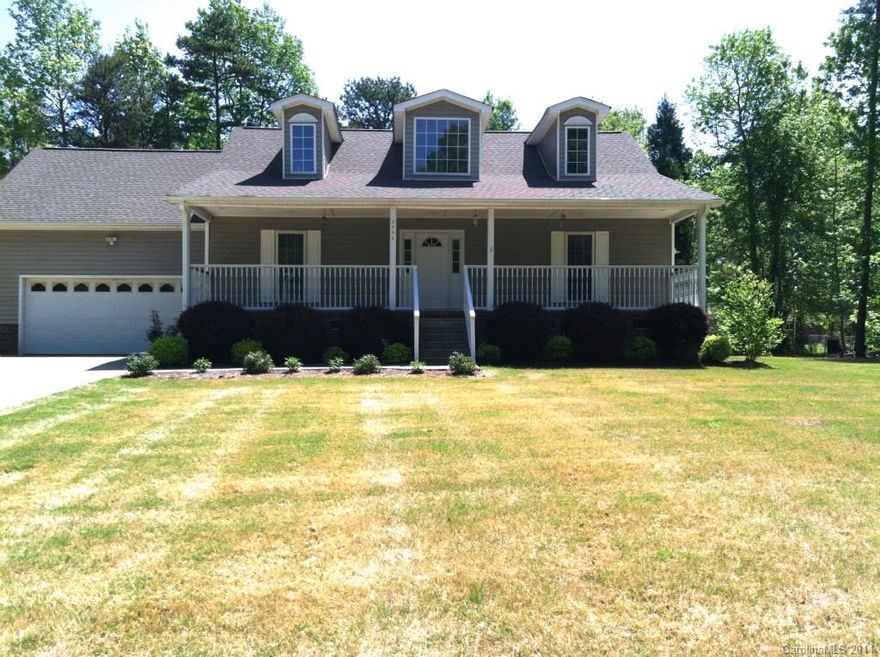 Enjoy the country life in this charming home on partially wooded lot.  Front porch welcomes you into spacious foyer and large great room with cathedral ceiling.   Enjoy the double shower or jacuzzi garden tub in master bathroom  This house has been lovingly taken care of:new roof 2012,new $7,000 AC/furnace in 2013, septic pumped in October 2013.  Bonus room on upper level has own heat and A/C.  Lots of storage in the attic.
Only 1.7 miles from hwy 77, 45 min. to Columbia, 35-40 min to Charlotte