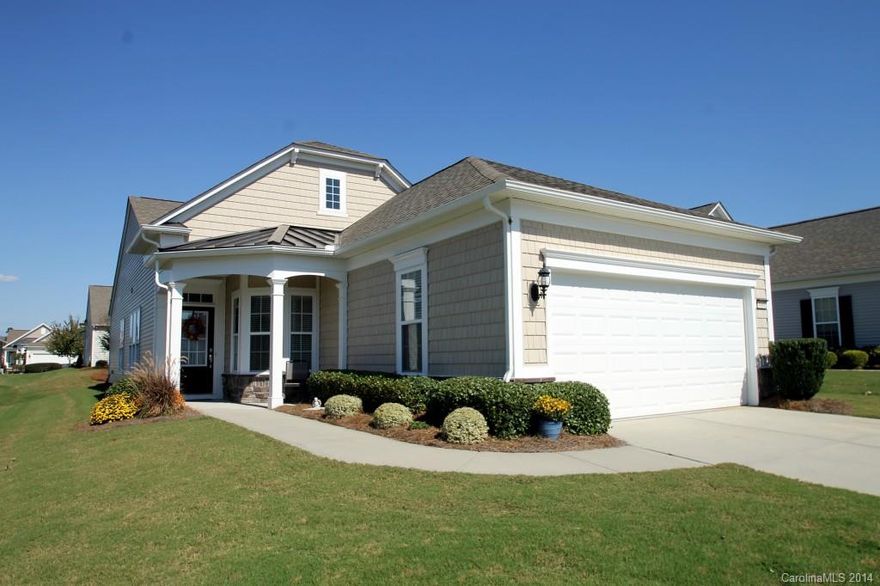 Charming 2 BD / 2 BA Pine Spring with Screen Porch & Patio! Hardwoods Throughout! Foyer Leads to Library. Great Room with Gorgeous Dining Area. Kitchen with Stainless Steel Appliances, Tile Backsplash, Maple Flat Panel Cabinetry. Screen Porch Leads to Patio. Owner’s Suite with Private Bath with Dual Sinks, Shower, & Large Walk-In Closet. Guest Bedroom & Guest Bathroom. Crown Molding in Great Room & Kitchen. Wainscoting in Foyer & Dining Room. Amenities Galore in this Active Adult Community!