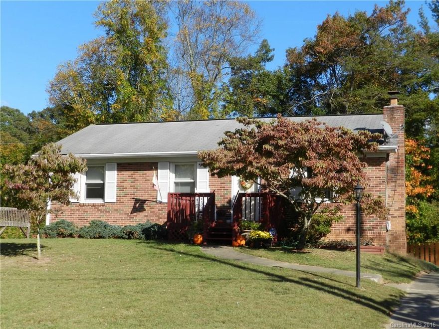 Major renovation in 2012 of Kitchen, baths, HVAC, and house is in fantastic, move-in condition! Back yard is an oasis of privacy, totally fenced, with wonderful patio, "entertaining deck," and some nice views. Located on a cul-de-sac in Parkway Forest, an established East Asheville neighborhood, it offers easy access to the grocery store, and a quick 10 minute drive to Downtown Asheville. Great natural light in living room. Cozy den in daylight, walkout basement with woodstove.