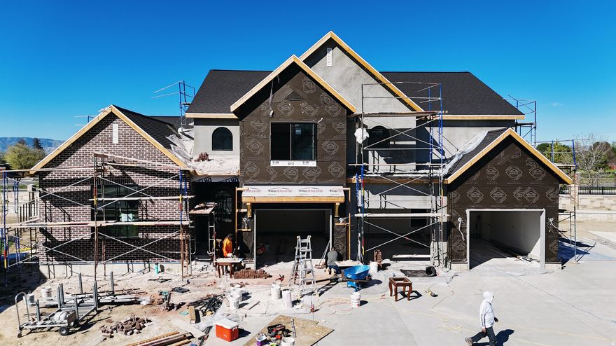 The Madison, one of our most sought-after floor plans, now available in the beautiful Autumn Crest neighborhood. One of two of our last homes. Cul-de-sac lot. Designed with space and comfort in mind, this home offers a bright, open feel perfect for modern living. The main level features a luxurious primary suite with a spa-like en-suite bath and a private office, ideal for work or relaxation. The open floor plan, high ceilings, custom finishes, and fireplace along with many built ins and arches make this feel like HOME. This is our Final phase. The Basement set up for a future ADU with Basement entrance. Upstairs, you'll find four spacious bedrooms and two full bathrooms, providing room for everyone.