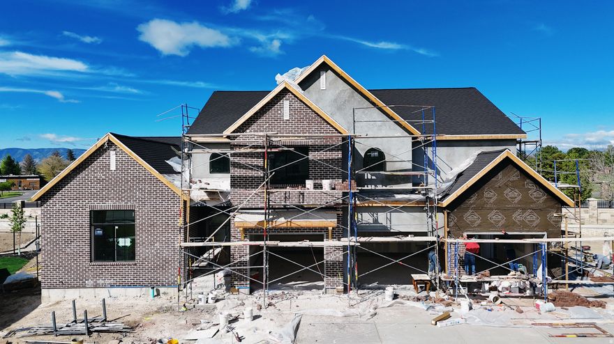 The Madison, one of our most sought-after floor plans, now available in the beautiful Autumn Crest neighborhood. One of two of our last homes. Cul-de-sac lot. Designed with space and comfort in mind, this home offers a bright, open feel perfect for modern living. The main level features a luxurious primary suite with a spa-like en-suite bath and a private office, ideal for work or relaxation. The open floor plan, high ceilings, custom finishes, and fireplace along with many built ins and arches make this feel like HOME. This is our Final phase. The Basement set up for a future ADU with Basement entrance. Upstairs, you'll find four spacious bedrooms and two full bathrooms, providing room for everyone.