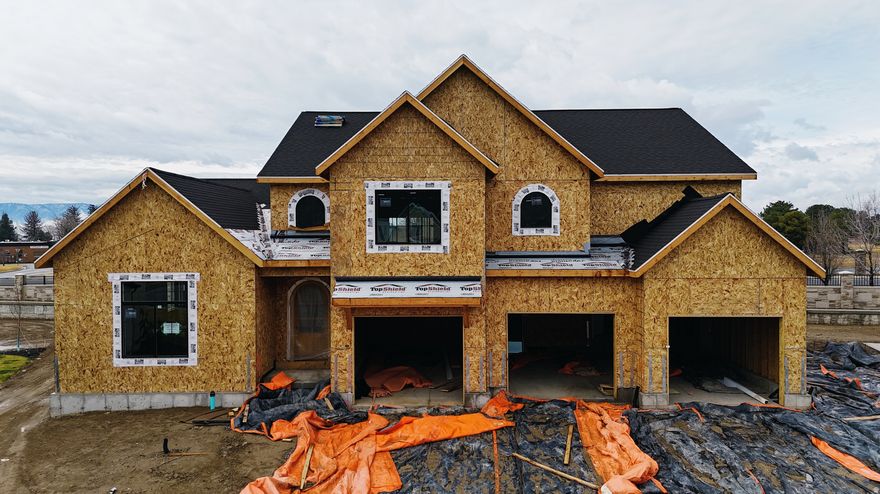 The Madison, one of our most sought-after floor plans, now available in the beautiful Autumn Crest neighborhood. One of two of our last homes. Cul-de-sac lot. Designed with space and comfort in mind, this home offers a bright, open feel perfect for modern living. The main level features a luxurious primary suite with a spa-like en-suite bath and a private office, ideal for work or relaxation. The open floor plan, high ceilings, custom finishes, and fireplace along with many built ins and arches make this feel like HOME. This is our Final phase. The Basement set up for a future ADU with Basement entrance. Upstairs, you'll find four spacious bedrooms and two full bathrooms, providing room for everyone.