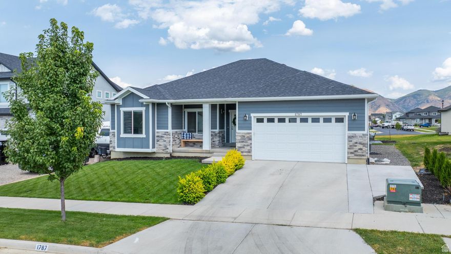 Welcome to this stunning rambler in the heart of Spanish Fork, offering the perfect blend of comfort and style. This beautifully designed home features an open-concept layout with spacious living areas that flow seamlessly, ideal for both everyday living and entertaining. Large windows fill the home with natural light while capturing breathtaking mountain views right from your backyard. Perfectly situated near schools, parks, shopping, and all the charm Spanish Fork has to offer, this home is a rare find that combines modern living with the beauty of Utah's landscape. Schedule your personal tour today!   Square footage figures are provided as a courtesy estimate only and Buyer is advised to obtain an independent measurement.