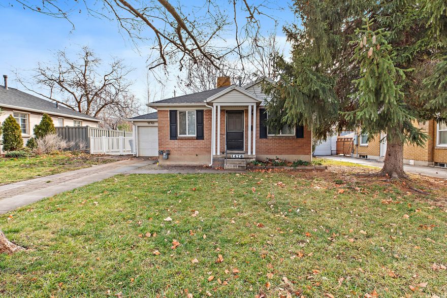 PRICED TO SELL! This cozy brick home sits on a quiet, tree-lined Millcreek City street. This Millcreek location is within walking distance of the Millcreek Commons development, where you will find everything you need nearby. The neighborhood is a good mix of young and older families, so everyone feels at home. The four bedrooms and two family rooms make this home very functional for its size. Plumbing in the basement for a second bathroom awaits the buyer's handiwork to make the home even more functional. The roof and evaporative cooler were replaced in 2021, with windows, kitchen, furnace, water heater, paint, blinds, and carpet replaced in the recent past. Summer days spent playing croquet, soccer, and football in the shade of the majestic sycamore trees in the large fenced backyard create unforgettable memories. IT'S MOVE-IN READY! Home is being SOLD AS IS.
