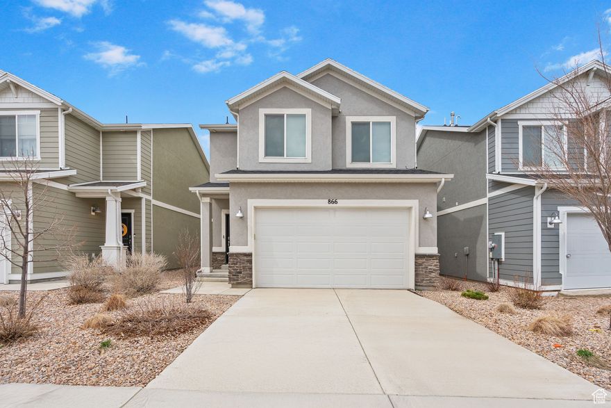 Move-in ready and waiting for you! This 3-bedroom, 2.5-bathroom features a bright and airy floor plan with a spacious loft. Built in 2020, it is like new, hardly lived in. The HOA takes care of all landscaping, allowing you to enjoy your weekends without worry. With a 2-car garage and quick access to I-15, this home offers everything you need. Built in shelves in the garage give you plenty of storage! Plus, the refrigerator, washer, and dryer are included! Don't wait, make this your new home today! Explore the home virtually with our 3D tour!  Square footage figures are provided as a courtesy estimate only and were obtained from County Records. Buyer is advised to obtain an independent measurement.