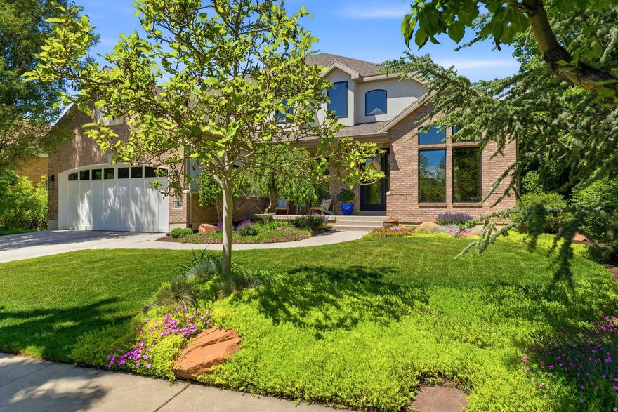Rarely available in the Woodstock Meadows neighborhood, this beautiful two-story home is nestled on a quiet, tree-lined street and has been lovingly cared for by the same family for more than 21 years. Warm, sophisticated, and thoughtfully designed, the home offers inviting spaces perfect for entertaining as well as comfortable everyday living. The kitchen is truly the heart of the home, featuring custom cabinetry, Bosch stainless steel appliances, a Sub-Zero refrigerator, and stunning Taj Mahal countertops. The spacious great room flows seamlessly from the kitchen to the dining and living areas, creating an ideal setting for gatherings and daily life alike. Step outside to enjoy the expansive deck and patio, offering private outdoor living space perfect for relaxing or entertaining in your own backyard oasis. The beautifully appointed primary suite features a spa-like bath. Thoughtfully renovated, every detail has been carefully curated with intention and quality craftsmanship. Interior updates include new paint throughout from ceiling to floor, updated kitchen countertops, backsplash, sink, and hardware, as well as all new tile, countertops, sinks, hardware, toilets, and lighting in the bathrooms and laundry areas. Solid wood core doors are featured throughout the home. Exterior improvements include new stucco, Pella windows and doors, an updated deck, and a hot tub. Nestled in a peaceful neighborhood, this home offers unparalleled comfort, energy efficiency, and elegant living, all with easy access to Utah's world-class skiing, hiking, and biking in the nearby mountains, as well as Salt Lake International Airport. The property is just minutes from Fashion Place Mall, Sports Mall, Awaken Studios, and the popular Sunday Farmers Market at Wheeler Farm. Convenient freeway access makes commuting throughout the valley simple and efficient. Located within walking distance of Woodstock Elementary, a Granite School District designated gifted and talented school, and just minutes from St. Vincent Catholic School, Cottonwood Country Club, and Big and Little Cottonwood Canyons, this location combines convenience with exceptional lifestyle amenities. Enjoy lower Murray City taxes, no HOA, and direct access to the Murray biking and walking trail, which connects all the way to Wheeler Farm and its beloved summer farmers markets. Square footage figures are provided as a courtesy estimate only; Buyer is advised to obtain an independent measurement. **Chandelier in upstairs back bedroom to be excluded. ***24 hr notice for all showings.