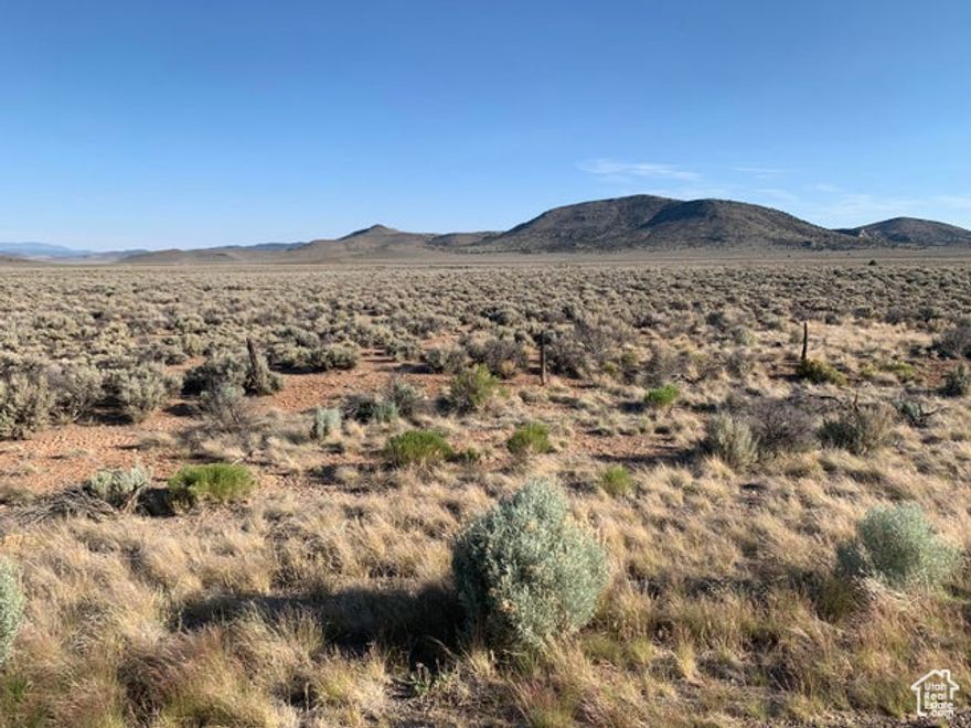 26.75 acres available for purchase near the town of Modena, Utah. Land is zoned AGRICULTURAL NON-FAA UNIMPROVED. Power is near by and no water available with sale. Private Remarks: Lot available to see anytime.