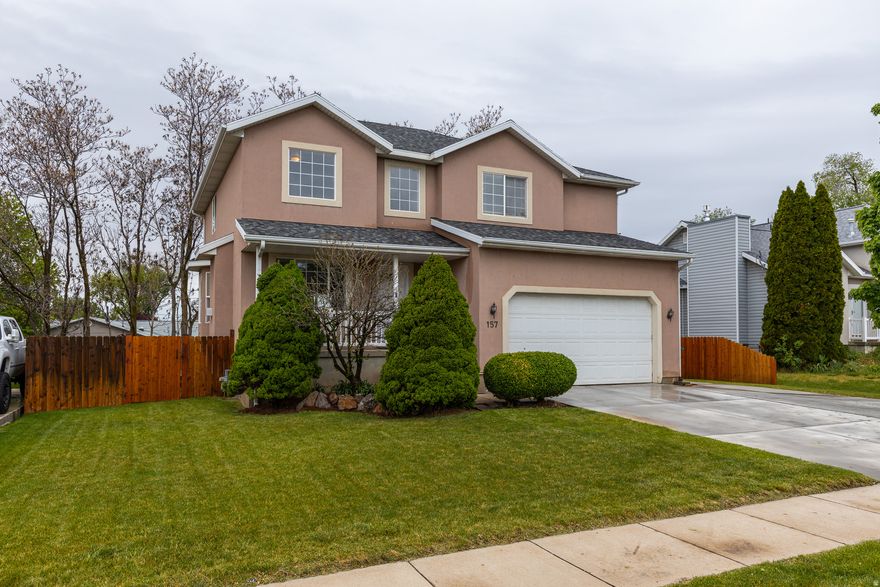 Welcome to 157 N 750 W - one of Layton's best values under $550K. This beautifully maintained 4-bedroom, 3-bathroom home offers 2,400 sqft of thoughtfully designed living space, filled with natural light and built for the way families actually live. Perfectly positioned in Davis County, you're just 5 minutes from Hill Air Force Base, 10 minutes to the Adams Canyon Trailhead, 15 minutes to Station Park's upscale dining and shopping, and only 45 minutes to world-class skiing at Snowbasin Resort. Salt Lake City is a straight 25-minute shot south on I-15. Recent updates to the house include a new driveway (2025), upgraded fence (2025), new roof (2018), new furnace (2019) and replaced backyard deck (2024). Top-rated Davis School District and centrally located in Layton, this one won't last. Schedule your private tour today. Square footage figures are provided as a courtesy estimate only and were obtained from County records.  Buyer is advised to obtain an independent measurement.