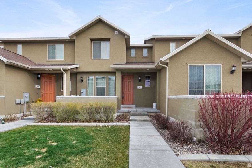 Welcome to this beautifully maintained modern townhome in the heart of Stansbury Park. Located on a quiet street, this home features an open-concept main level, bright natural light, two spacious bedrooms with private baths, and an attached garage. The layout is designed for comfort and low-maintenance living-perfect for busy professionals, first-time buyers, or anyone wanting a lock-and-leave lifestyle.  Enjoy all the perks of this thriving community, including nearby parks, schools, walking paths, and quick access to commuting routes. Stansbury Park is known for its strong sense of community and pride of ownership, making it one of Tooele County's most desirable places to call home.  Don't miss your chance to own a turn-key property in a growing and sought-after neighborhood. Schedule your showing today!