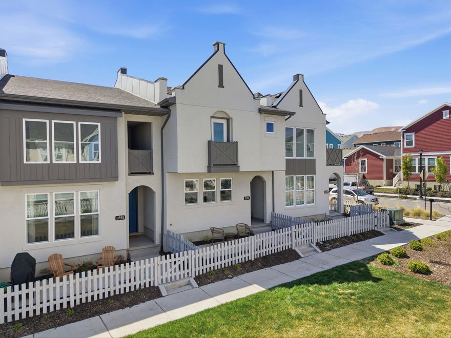 Not all townhomes are created equal, and this one proves it. This spacious home in the heart of Daybreak features vaulted ceilings, an open floor plan, and an abundance of natural light that sets it apart from the moment you walk in. The main level flows naturally from the kitchen through the dining and living areas, and a large front patio extends your living space outdoors. A two-car garage and beautiful finishes throughout round out a home that is completely turnkey and ready to go! Located within walking distance of the new Cove House,  watercourse feature, parks, and a proposed school and shops, with quick access to 118th South, the location is just as strong as the home itself. Daybreak's master-planned amenities, including pools, Oquirrh Lake, trails, and year-round events, make this one of the most livable neighborhoods in the valley. Priced to sell fast! Buyer to verify all MLS information.