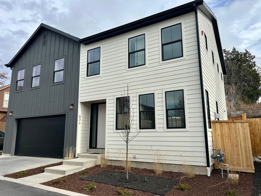 Discover this beautiful new construction home nestled on a quiet cul-de-sac, centrally located near the University of Utah and the lively 9th and 9th neighborhood, offering easy access education, eclectic dining, boutique shopping, and cultural hotspots. Step inside to an open-concept design that seamlessly blends modern elegance and functionality. The gourmet kitchen boasts sleek quartz countertops, high-end LG Studio appliances, ample cabinetry for storage, and a spacious island ideal for casual meals or entertaining guests. Adjacent, the inviting living room centers around a cozy gas fireplace, creating a warm focal point for family gatherings or quiet evenings. Upstairs, you'll find four generously sized bedrooms, highlighted by a luxurious primary suite featuring a walk-in closet for all your wardrobe needs and an expansive en-suite bathroom with heated tile floors, dual vanities, a soaking tub, and a separate glass-enclosed shower for ultimate relaxation. Outside, the low-maintenance yard is designed for effortless enjoyment, complete  with a beautifully paved patio perfect for al fresco dining, barbecues, or simply unwinding under the stars. This move-in-ready gem combines contemporary style, premium finishes, and a prime location-don't miss your chance to call it home!  Square footage figures are provided as a courtesy estimate, buyer is advised to obtain an independent measurement.