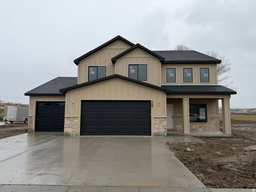 Seller offering a 3% ($18,597) incentive for a limited time! Come check out this beautiful NEW home and awesome community! Spacious 9ft ceilings on the main floor. Tons of big windows for lots of natural light. Gorgeous quartz countertops and quality soft close cabinets that go the ceiling. Open concept kitchen, dining, and great room area. Upstairs you'll find all the bedrooms and a loft area. You'll love the views from your primary suite. Enjoy the soaker tub or the separate walk in shower and the big walk in closet. Laundry room upstairs as it should be. Four car garage for all the toys. You are going to love your new Kartchner home and will be impressed by the quality and attention to detail! Two year warranty! Square footage figures are provided as a courtesy estimate only and were obtained from sales brochure. Buyer is advised to obtain an independent measurement.