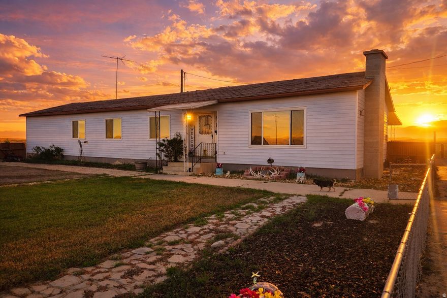 79.57 Acres  Farm/Ranch + Home  Water Shares + Equipment Option Wide-open country living with panoramic views and serious farming potential. This offering totals 79.57 acres across Parcel 02-0088-0008 and Parcel 02-0088-0005. The residence includes 3 bedrooms, 2 baths, and a large multi-purpose room with a built-in jungle gym, plus a covered back porch for year-round enjoyment.  Property & Improvements Multiple outbuildings, large barn, chicken coop, dedicated dog run, and a powered shed (110V & 240V) Ample parking and two automatic livestock water troughs Greenbelt status in place Irrigation, Water & Cultivation 10 acres of irrigated alfalfa using flood irrigation with gated pipe Additional acres are cultivable with a future pressurized irrigation system Water Shares included: 10 Carbon Canal/High Water Shares + 9 Scofield/Price River Water Users Shares Canal runs through the property with two existing canal crossings (upgrade options available)  Recreation & Access ATV trails meander through the acreage for easy access and weekend fun Farm Equipment (available with the right offer) Oliver 14' tandem disc, John Deere 3-bottom rollover plow, Case 10' grain drill, Gehl 1310 round baler, 14' fantail land leveler, 3-point round bale unroller5-row slide marker, Extra gated irrigation pipe  A rare opportunity to expand an ag operation or embrace a tranquil country lifestyle-additional acreage and water shares may be available. USDA Farm Service Agency loans may be an option for manufactured homes built prior to 1976-ask for details.