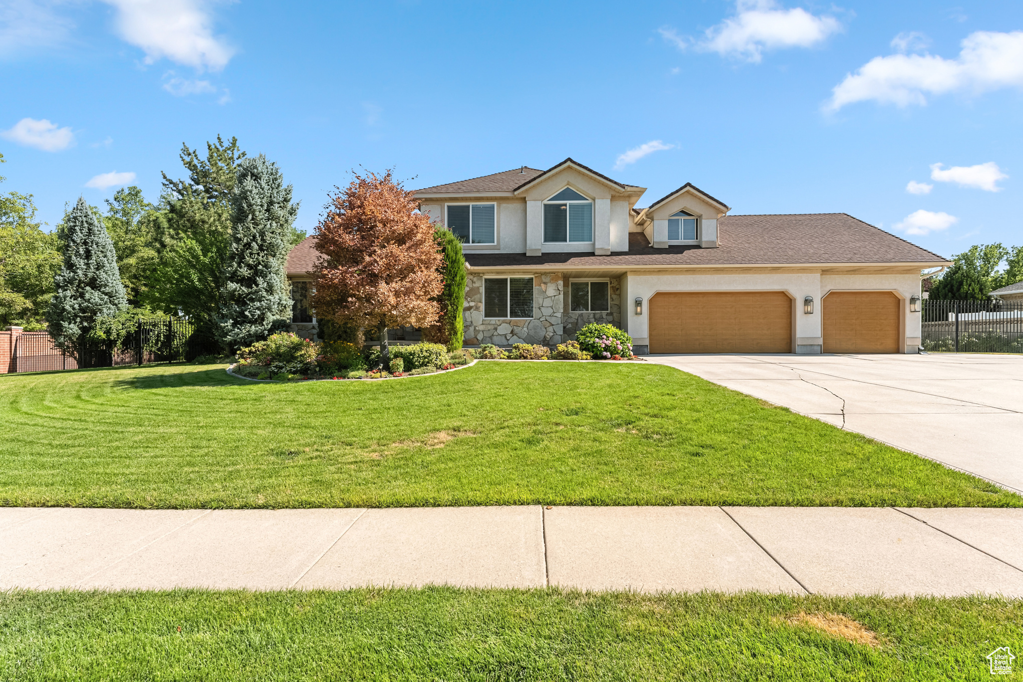 **Preferred Lender Buyer Incentive: $20,000 towards Closing Cost, Rate Buydown, and/or Property Enhancements(contact agent for details)** Welcome to this one-of-a-kind home, nestled in West Jordan. Tucked in a quiet neighborhood, this beautiful home features 5 bedrooms, 4 1/2 bathrooms, with updates inside and out. The spacious layout includes a formal living and dining room, along with a dream kitchen boasting Italian granite countertops, a three-bowl sink, induction cooktop, and double convection ovens-perfect for cooking and hosting with ease. Upstairs, the primary suite offers a luxurious, spa-like retreat, complete with a freestanding soaking tub, a separate walk-in shower, and a custom walk-in closet, designed by Closets by Design. Downstairs, the fully finished basement doubles as a comfortable mother-in-law suite or an ideal space for entertaining, featuring a second kitchen, game room, and a Jack & Jill bathroom connecting the bedrooms. Step outside and discover your personal backyard oasis! Enjoy a heated in-ground saltwater pool, 6 person hot tub, sports court, gazebo, in-ground trampoline, fruit trees, grapevines, and raised garden beds, all surrounded by mature trees and a brick privacy wall. Additional highlights include solar panels, central vacuum, LVP and tile flooring, new carpet upstairs, and a massive walk-in attic for storage. Conveniently located just minutes from shopping, dining, top-rated medical facilities, along with easy access to highways and freeways, this home offers the perfect balance of privacy, convenience, and lifestyle. Shown by appointment only, schedule your private tour today and fall in love with this one-of-a-kind gem!.