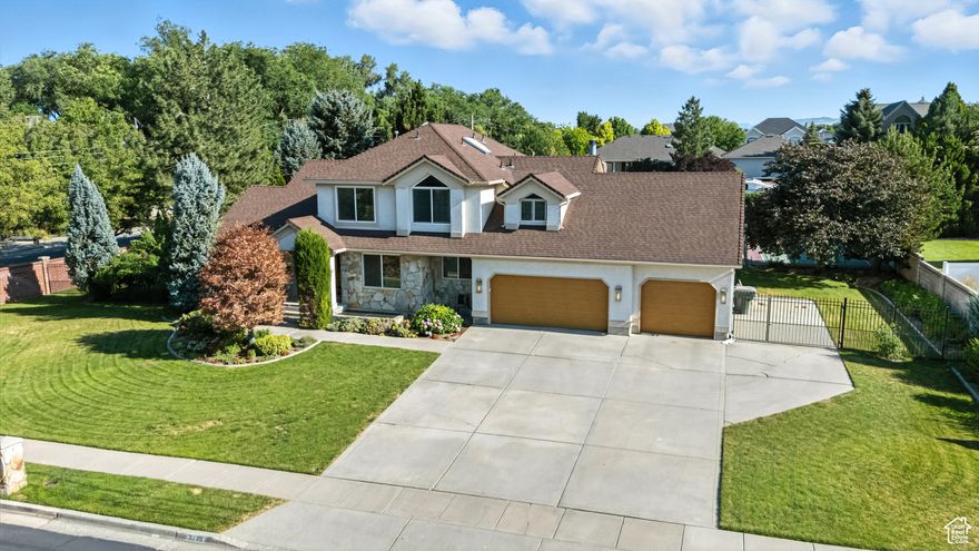 **Preferred Lender Buyer Incentive: $20,000 towards Closing Cost, Rate Buydown, and/or Property Enhancements(contact agent for details)** Welcome to this one-of-a-kind home, nestled in West Jordan. Tucked in a quiet neighborhood, this beautiful home features 5 bedrooms, 4 1/2 bathrooms, with updates inside and out. The spacious layout includes a formal living and dining room, along with a dream kitchen boasting Italian granite countertops, a three-bowl sink, induction cooktop, and double convection ovens-perfect for cooking and hosting with ease. Upstairs, the primary suite offers a luxurious, spa-like retreat, complete with a freestanding soaking tub, a separate walk-in shower, and a custom walk-in closet, designed by Closets by Design. Downstairs, the fully finished basement doubles as a comfortable mother-in-law suite or an ideal space for entertaining, featuring a second kitchen, game room, and a Jack & Jill bathroom connecting the bedrooms. Step outside and discover your personal backyard oasis! Enjoy a heated in-ground saltwater pool, 6 person hot tub, sports court, gazebo, in-ground trampoline, fruit trees, grapevines, and raised garden beds, all surrounded by mature trees and a brick privacy wall. Additional highlights include solar panels, central vacuum, LVP and tile flooring, new carpet upstairs, and a massive walk-in attic for storage. Conveniently located just minutes from shopping, dining, top-rated medical facilities, along with easy access to Bangerter Highway and I-15, this home offers the perfect balance of privacy, convenience, and lifestyle.