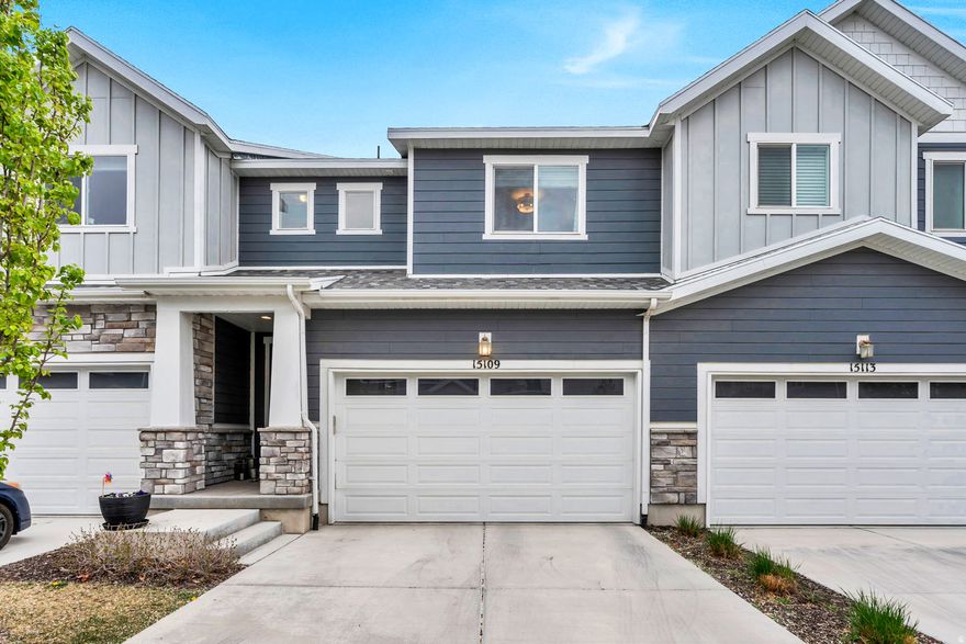 Check out this luxury town home minutes from I-15 in the heart of Bluffdale! Over 2500 sq. ft. of finished space including a grand 2 story entrance, massive kitchen with large island, gas stove, and drink fridge! Upstairs boasts 3 large rooms and a loft that can be used as a reading nook, office, or kids play area! Owner's added many details like custom Board and batten accent wall, and custom designed and hand painted children's room. Owner installed a WHOLE HOME SMART LIGHTING system, and created the perfect movie watching experience in basement with surround sound home theater speaker system. New owners can also enjoy the smart thermostat, and whole home Ethernet!   Home is walkable to Elementary and Middle school and next to the fantastic DayRanch park! This home won't last long to schedule your showing today!