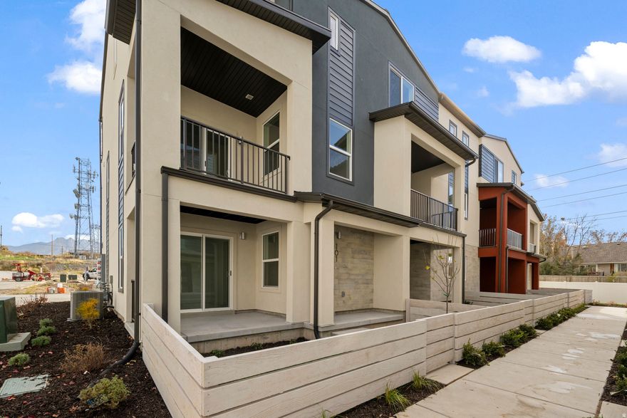 Ideally located in the heart of the Salt Lake Valley, this vibrant Murray community offers exceptional convenience-just minutes from I-15, I-215, the airport, and downtown SLC. You'll also enjoy close proximity to local schools, parks, and the Jordan River Trail.  This highly desirable end-unit townhome features a fenced front yard, an oversized patio, and a private balcony-providing two comfortable outdoor living spaces. With windows on three sides, the home is filled with natural light and even offers a slight west-facing mountain view. Inside, you'll find dark grey cabinets, a large open kitchen, and spacious living areas ideal for entertaining or everyday living.  Built with a high-efficiency design, the home includes enhanced insulation, energy-efficient windows, instant hot water, a programmable thermostat, solar-ready wiring, and a private garage with an EV outlet-offering year-round comfort and long-term savings.  Community amenities include green space perfect for pets, a playground, a BBQ gathering area, and ample guest parking.  Don't miss your chance to own this stylish, well-located, and energy-efficient home-contact the listing agent today!